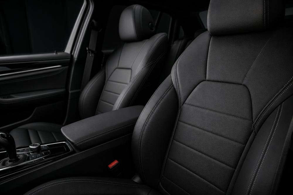 Pristine clean car interior with black leather seats